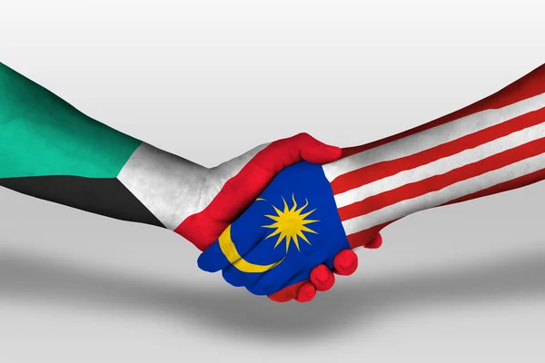 Рукопожатие Между Малайзией Кувейтскими Флагами Раскрашенными Руках Иллюстрация Вырезкой — стоковое фото