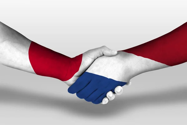 Handshake Netherlands Japan Flags Painted Hands Illustration Clipping Path — Zdjęcie stockowe