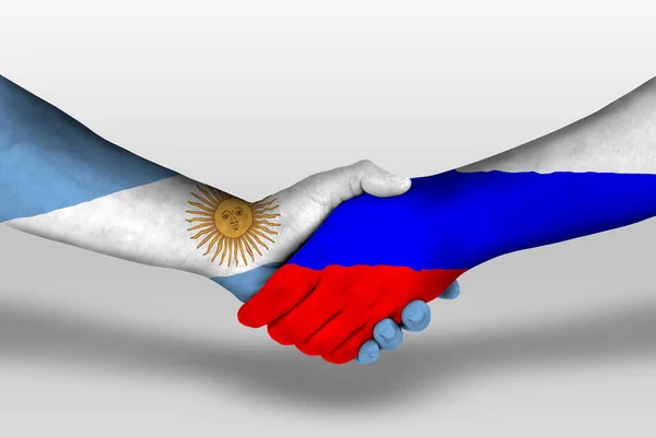 在手绘上俄罗斯国旗和Argentina国旗之间的握手 用裁剪路径说明 — 图库照片