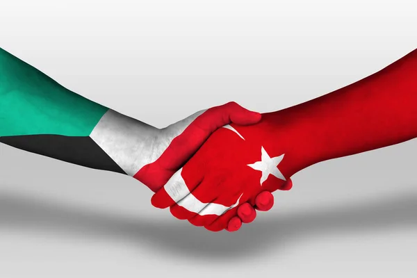 Рукопожатие Между Индейкой Кувейтским Флагом Нарисованное Руках Иллюстрация Вырезкой — стоковое фото