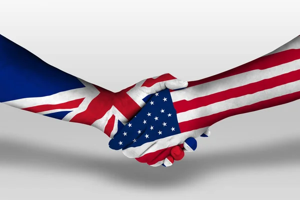 Handshake between united states of america and united kingdom flags painted on hands, illustration with clipping path.