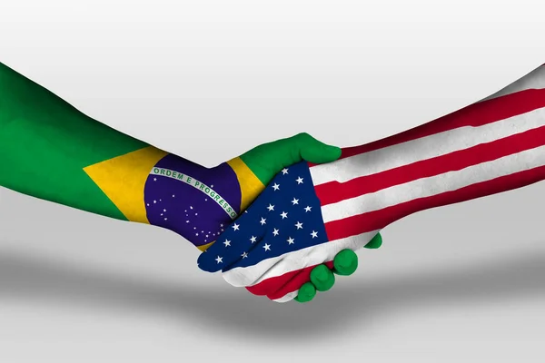Handshake between united states of america and brazil flags painted on hands, illustration with clipping path.