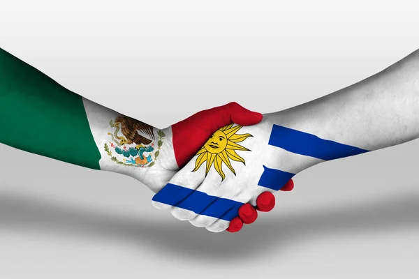 Рукостискання Між Уругваєм Мексіко Прапори Намальовані Руках Ілюстрації Відсіканням Шляху — стокове фото