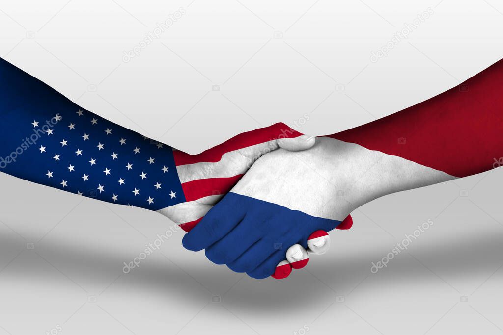 Handshake between netherlands and united states of america flags painted on hands, illustration with clipping path.