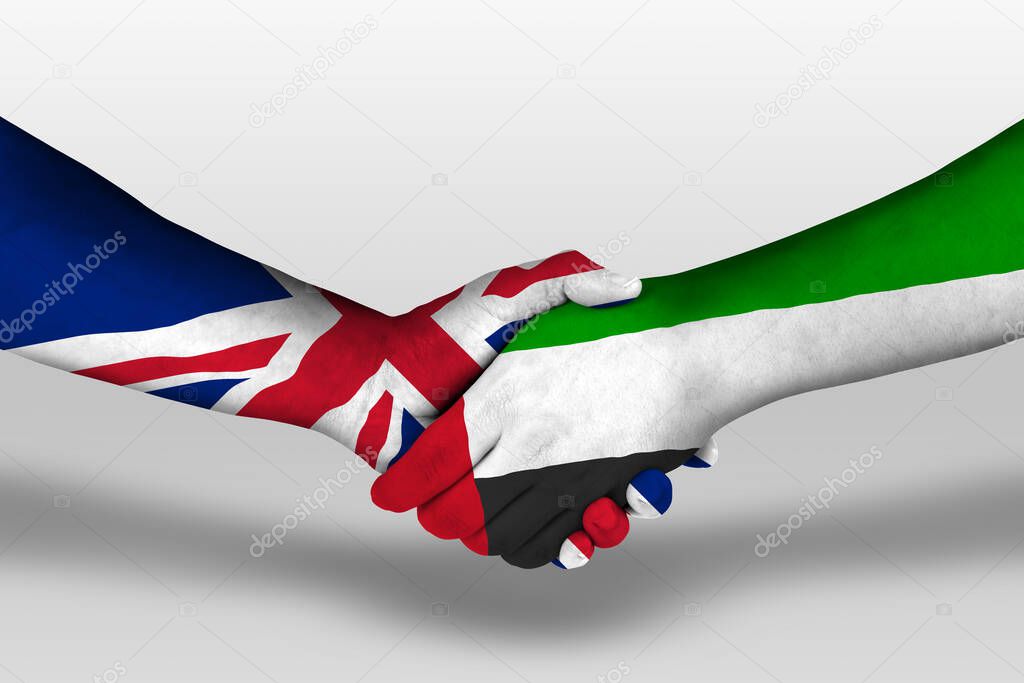 Handshake between united arab emirates and united kingdom flags painted on hands, illustration with clipping path.