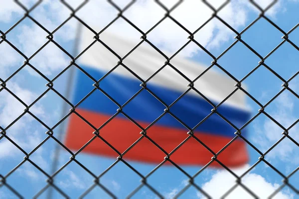 A steel mesh against the background of a blue sky and a flagpole with the flag of russia