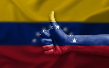 Venezuela bayrağıyla boyanmış el yapımı başparmak