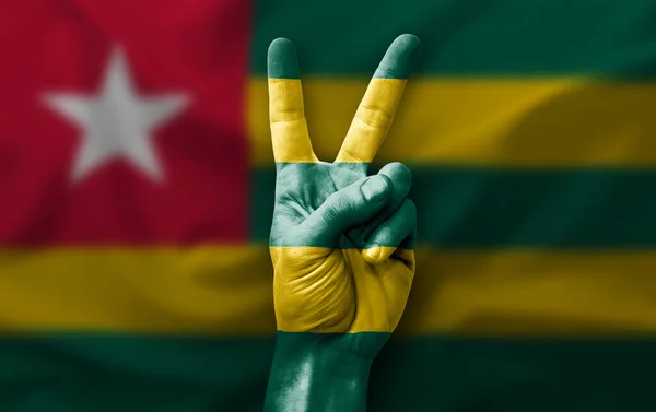Hand Making Victory Sign Flag Togo — Stock Fotó