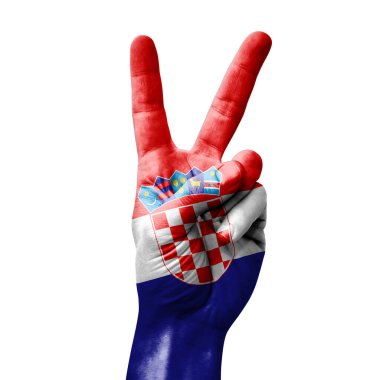 Hand making the V victory sign with flag of croatia