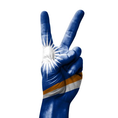 Hand making the V victory sign with flag of marshall islands