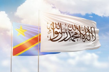 Sunny blue sky and flags of afghanistan and dr congo