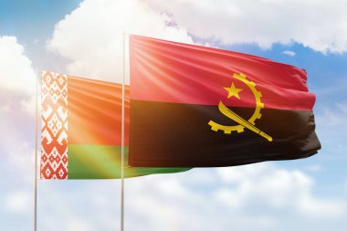Sunny blue sky and flags of angola and belarus