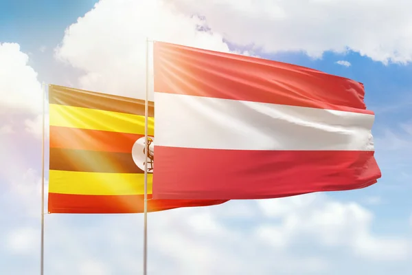 Sunny Blue Sky Flags Austria Uganda — Stock fotografie