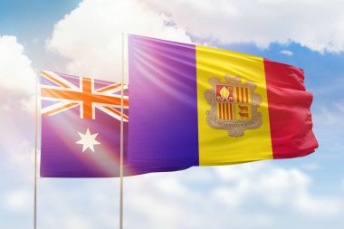 Sunny blue sky and flags of andorra and australia