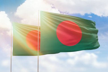 Sunny blue sky and flags of bangladesh and bangladesh