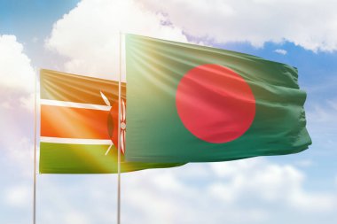 Sunny blue sky and flags of bangladesh and kenya