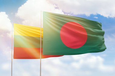Sunny blue sky and flags of bangladesh and lithuania