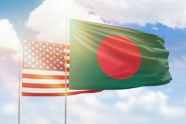 Sunny blue sky and flags of bangladesh and usa