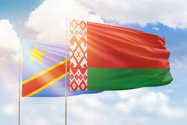 Sunny blue sky and flags of belarus and dr congo