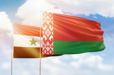 Sunny blue sky and flags of belarus and syria