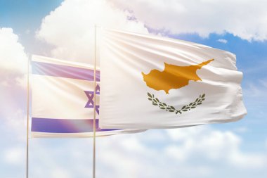 Sunny blue sky and flags of cyprus and israel