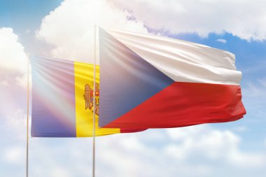 Sunny blue sky and flags of czechia and moldova