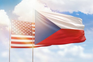 Sunny blue sky and flags of czechia and usa