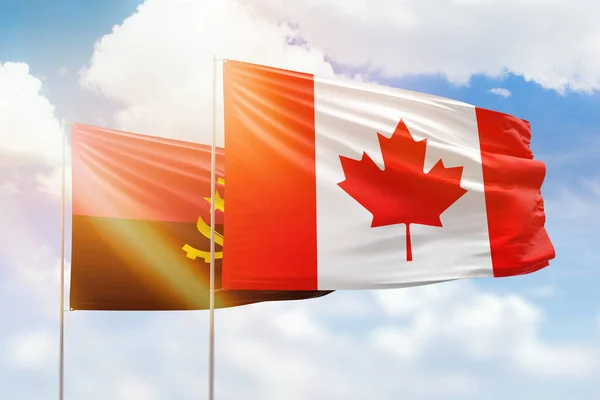 Sunny Blue Sky Flags Canada Angola —  Fotos de Stock