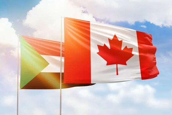 Sunny Blue Sky Flags Canada Sudan — ストック写真