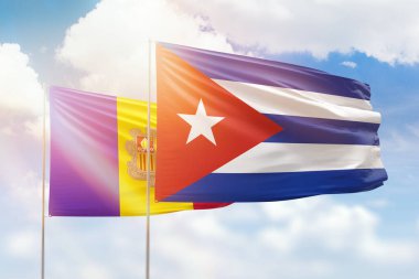 Sunny blue sky and flags of cuba and andorra