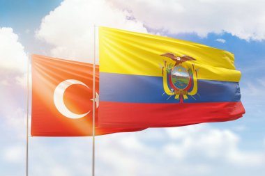 Sunny blue sky and flags of ecuador and turkey