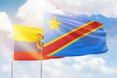 Sunny blue sky and flags of dr congo and ecuador