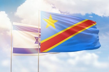 Sunny blue sky and flags of dr congo and israel