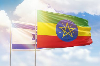 Sunny blue sky and flags of ethiopia and israel
