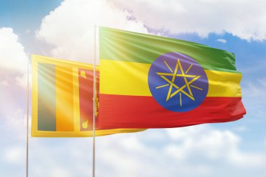 Sunny blue sky and flags of ethiopia and sri lanka