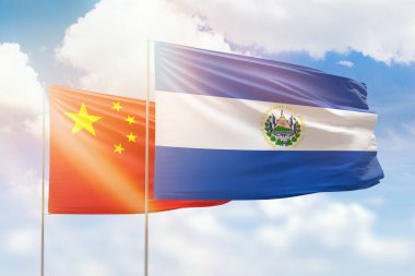 Sunny blue sky and flags of el salvador and china