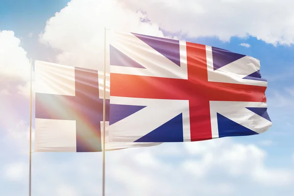 Sunny Blue Sky Flags Great Britain Finland — Stockfoto