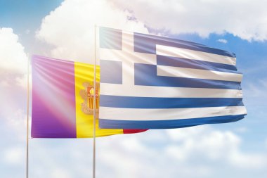 Sunny blue sky and flags of greece and andorra