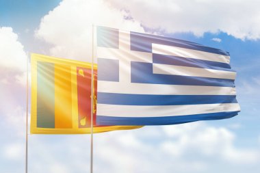 Sunny blue sky and flags of greece and sri lanka
