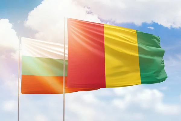 Sunny Blue Sky Flags Guinea Bulgaria — Stockfoto