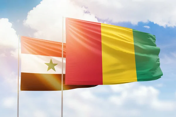 Sunny Blue Sky Flags Guinea Syria — Stockfoto