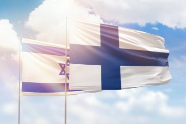 Sunny blue sky and flags of finland and israel