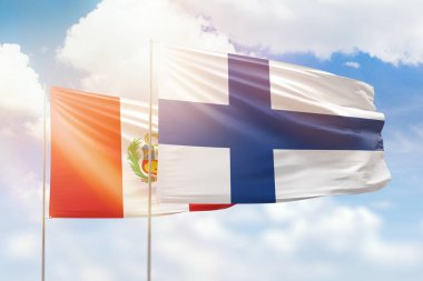 Sunny blue sky and flags of finland and peru