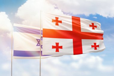 Sunny blue sky and flags of georgia and israel