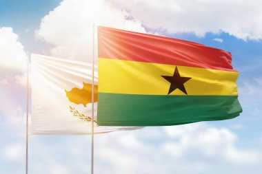 Sunny blue sky and flags of ghana and cyprus