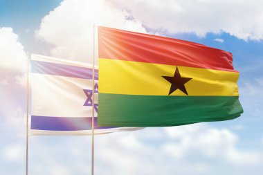 Sunny blue sky and flags of ghana and israel