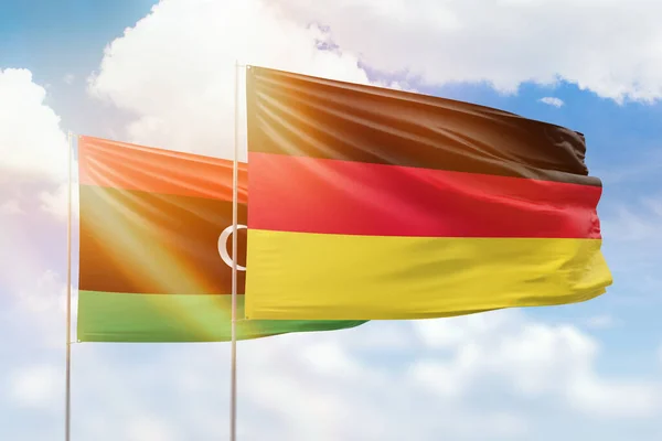 Sunny Blue Sky Flags Germany Libya — Stok fotoğraf
