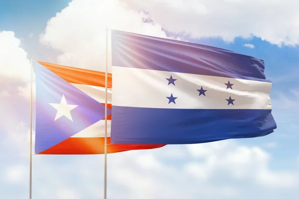 Sunny Blue Sky Flags Honduras Puerto Rico — ストック写真
