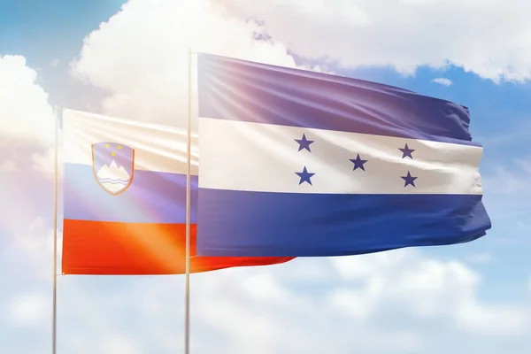 Sunny Blue Sky Flags Honduras Slovenia — ストック写真