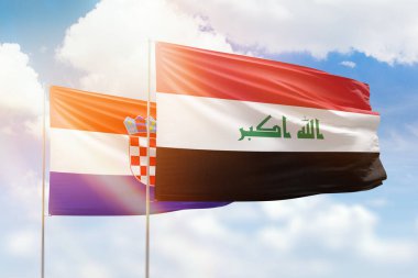 Sunny blue sky and flags of iraq and croatia